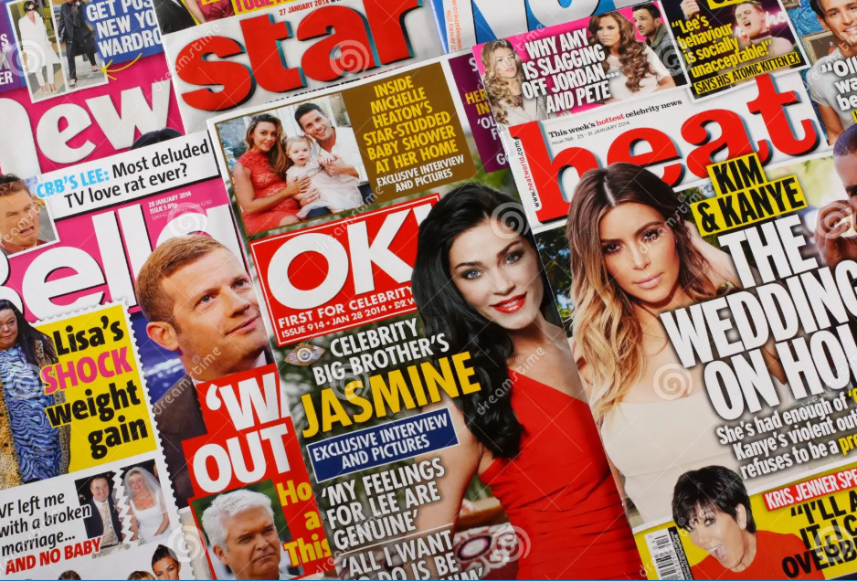 A stack of celebrity entertainment magazines featuring Clueless style fashion reminiscent of Cher Horowitz.